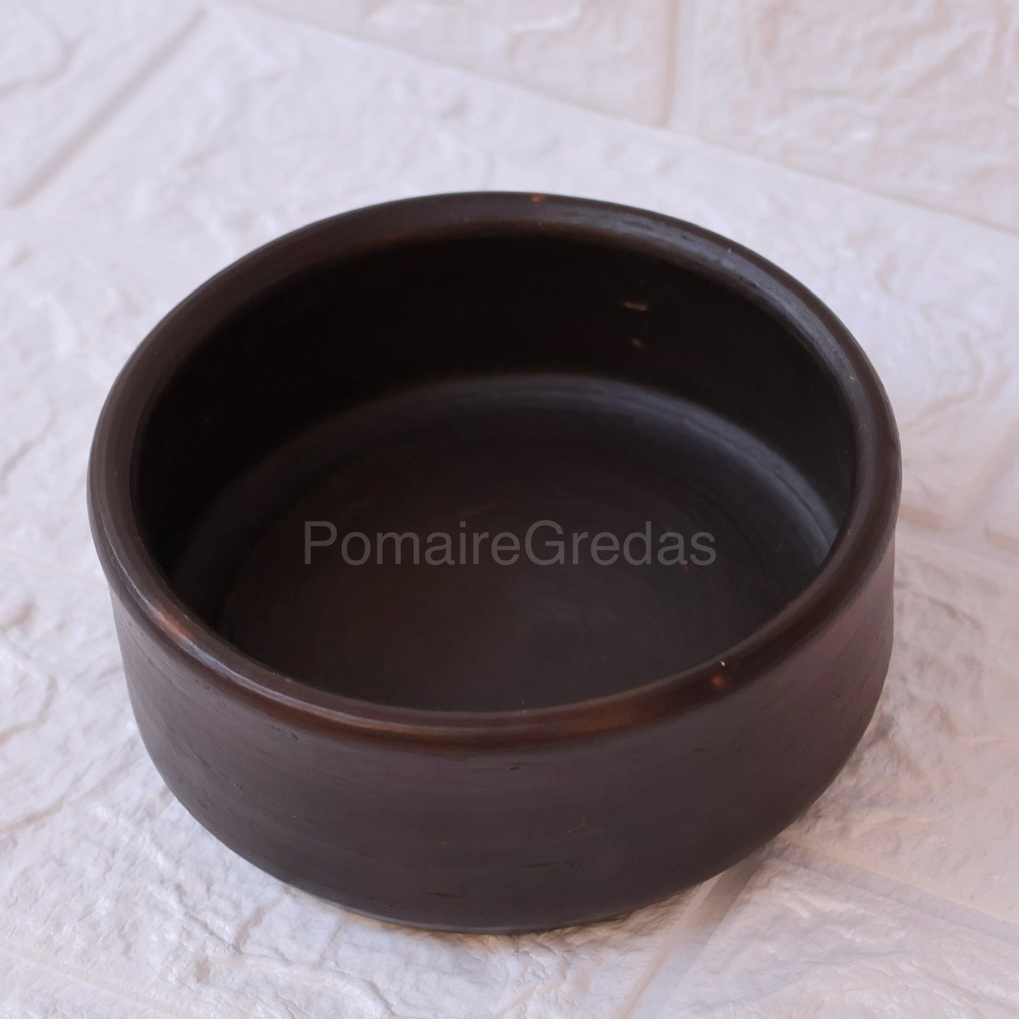 Plato redondo negro